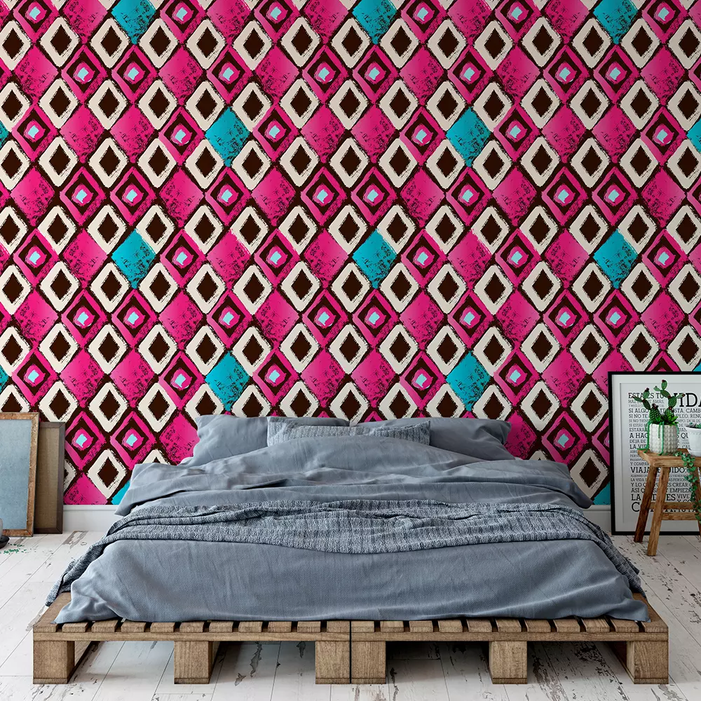 Dry brush rangoli in freehand geometrical shapes with bright magenta and turquoise colours.